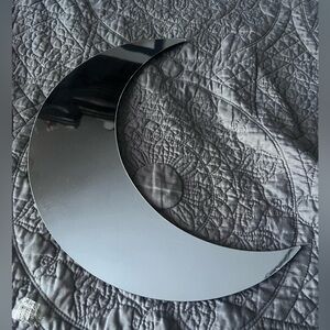 Crescent moon wall mirror, lightweight, great for an apartment or dorm.
